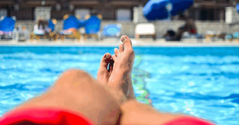 FEET NEXT TO A POOL